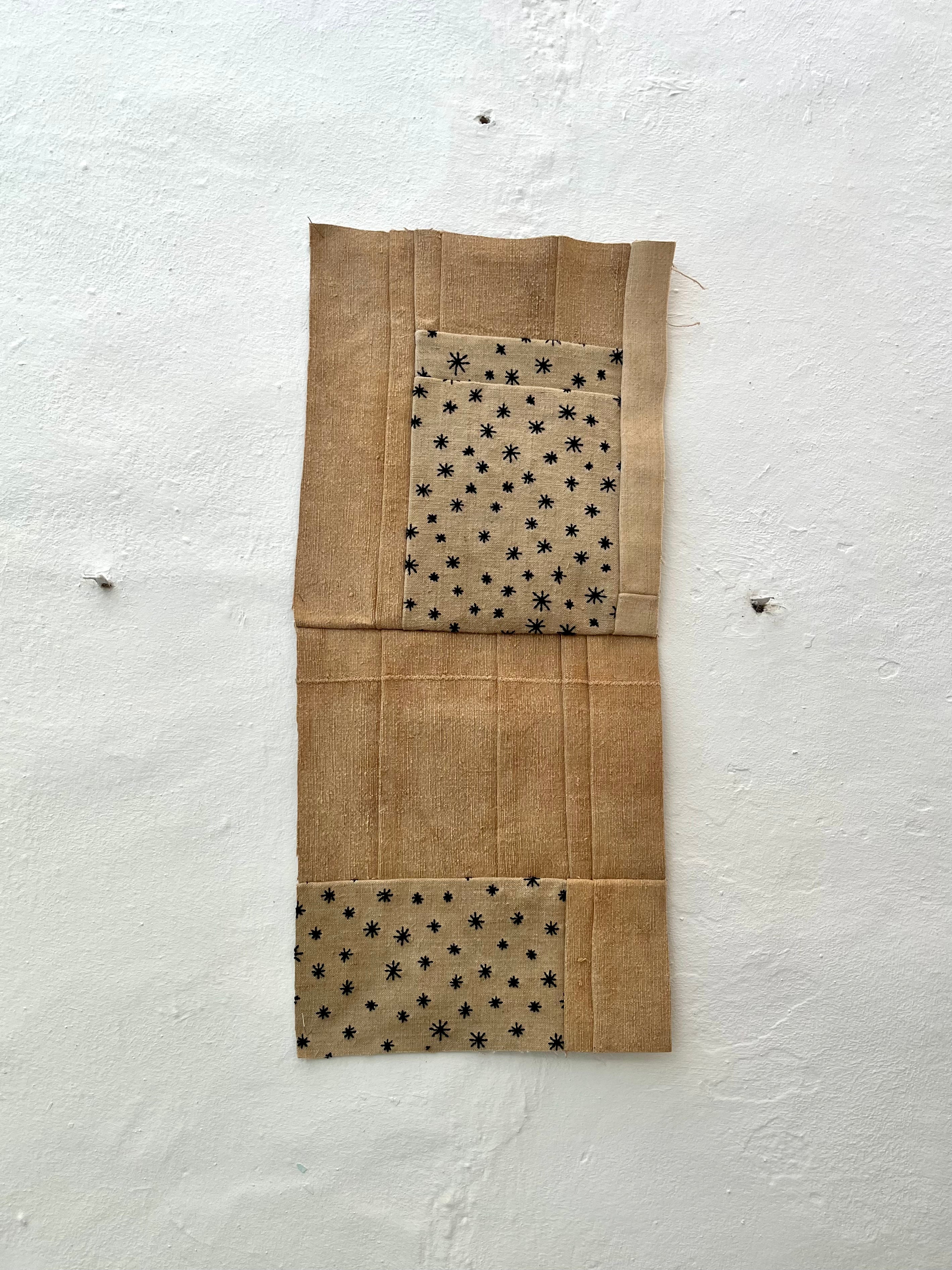 “Saquet de patchwork estrellat”