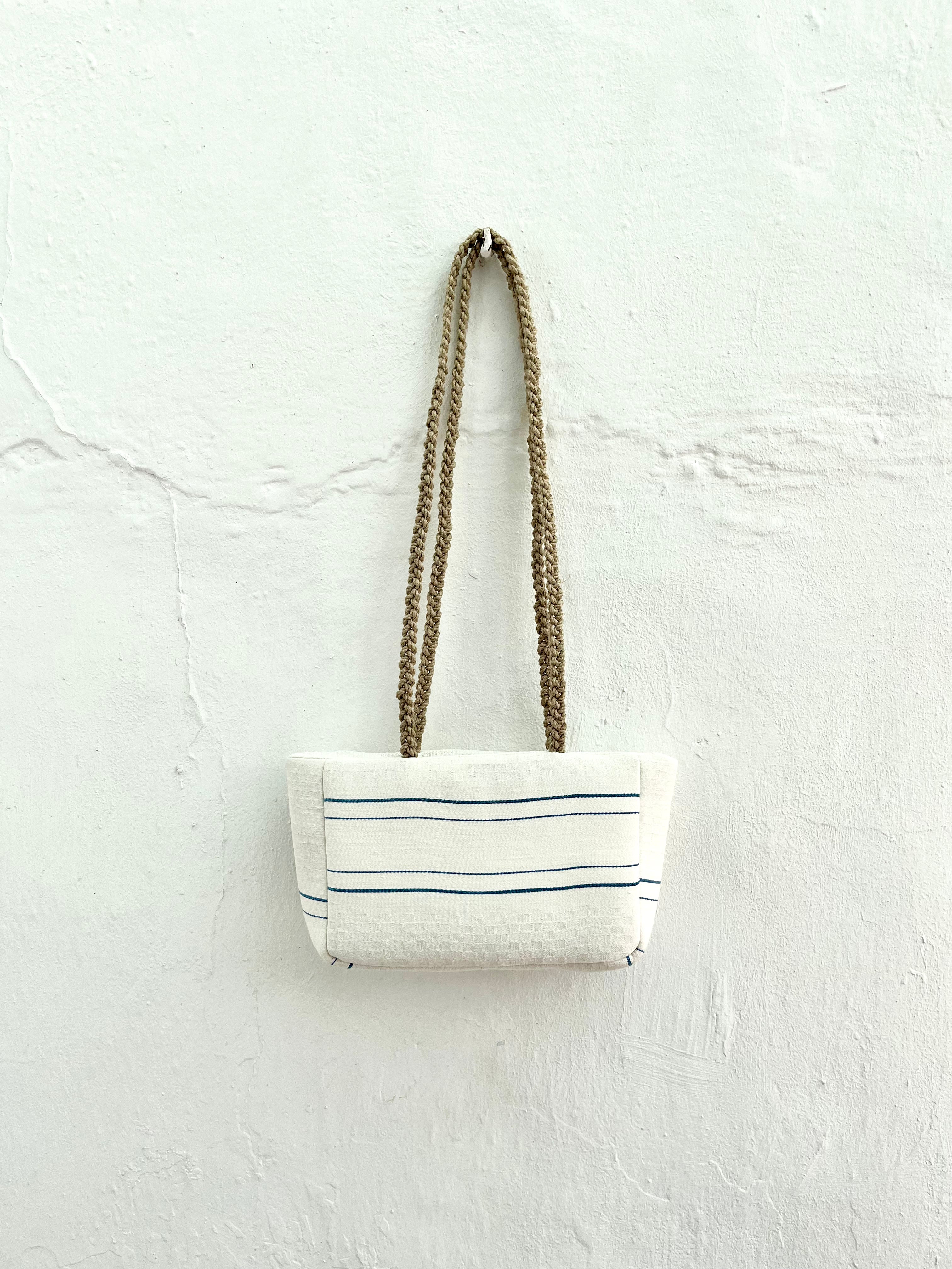 “The white retxat bag”