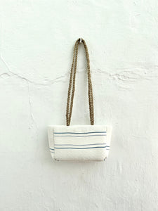 “The white retxat bag”