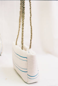 “The white retxat bag”