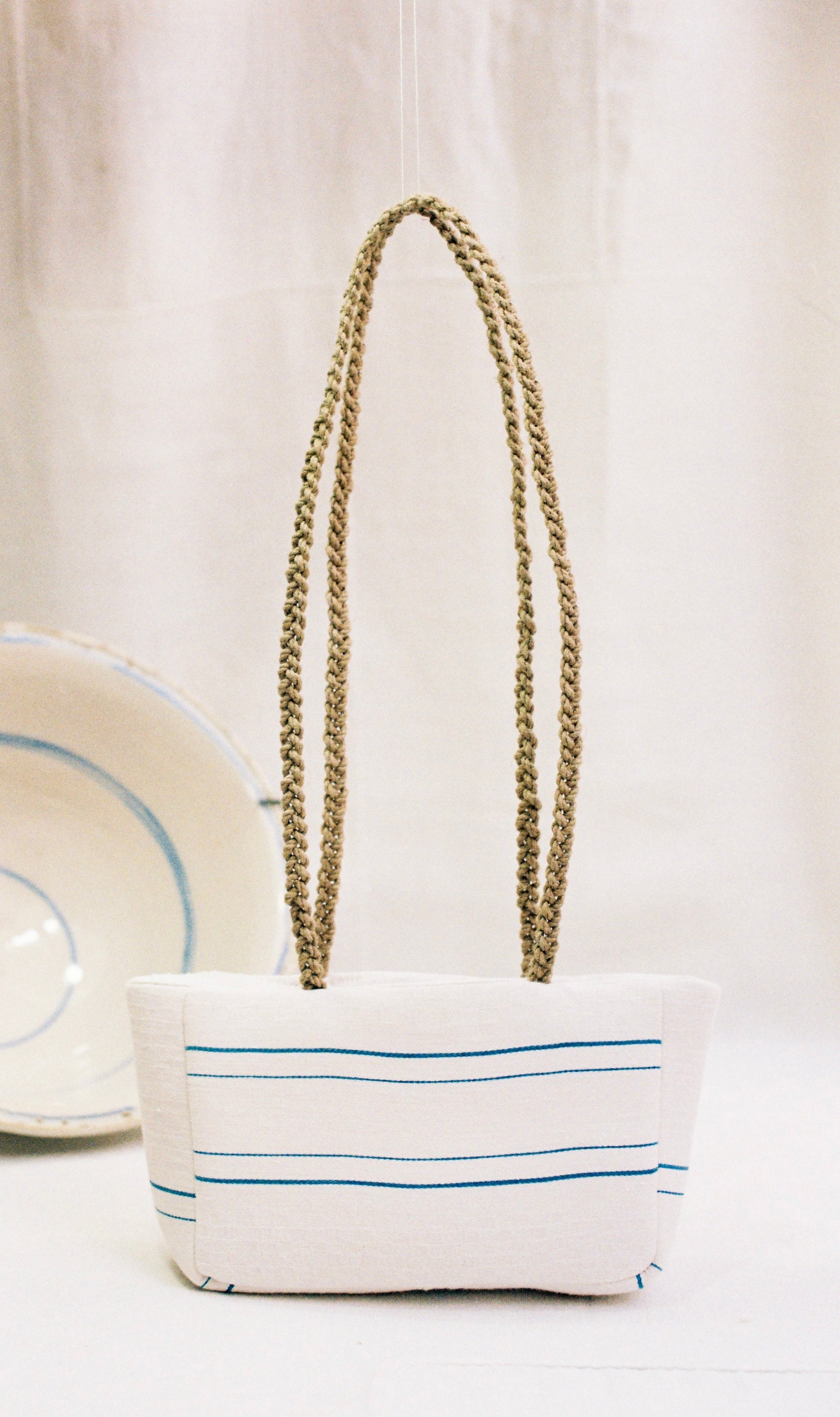 “The white retxat bag”